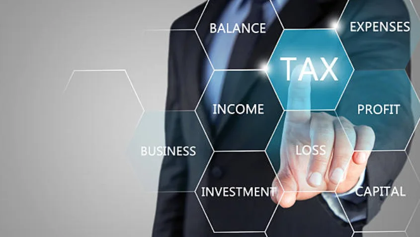 Best Corporate Tax Services in Dubai, UAE Person navigates tax software on the computer screen, ensuring financial clarity and efficiency with a positive approach
